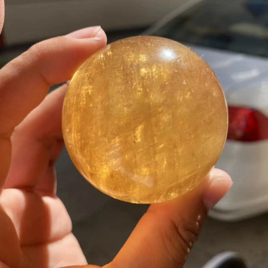Natural Citrine Calcite Quartz Crystal Sphere โ Healing Gemstone with Wooden Stand